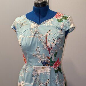 Dress Tells Aqua Floral fit and flare dress   Size: M